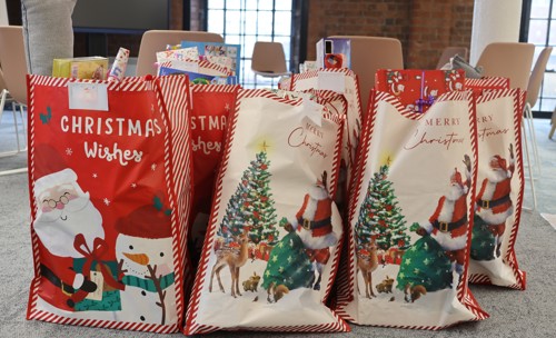 Bags of gifts ready to be delivered as part of Plus Dane's winter campaign 2025